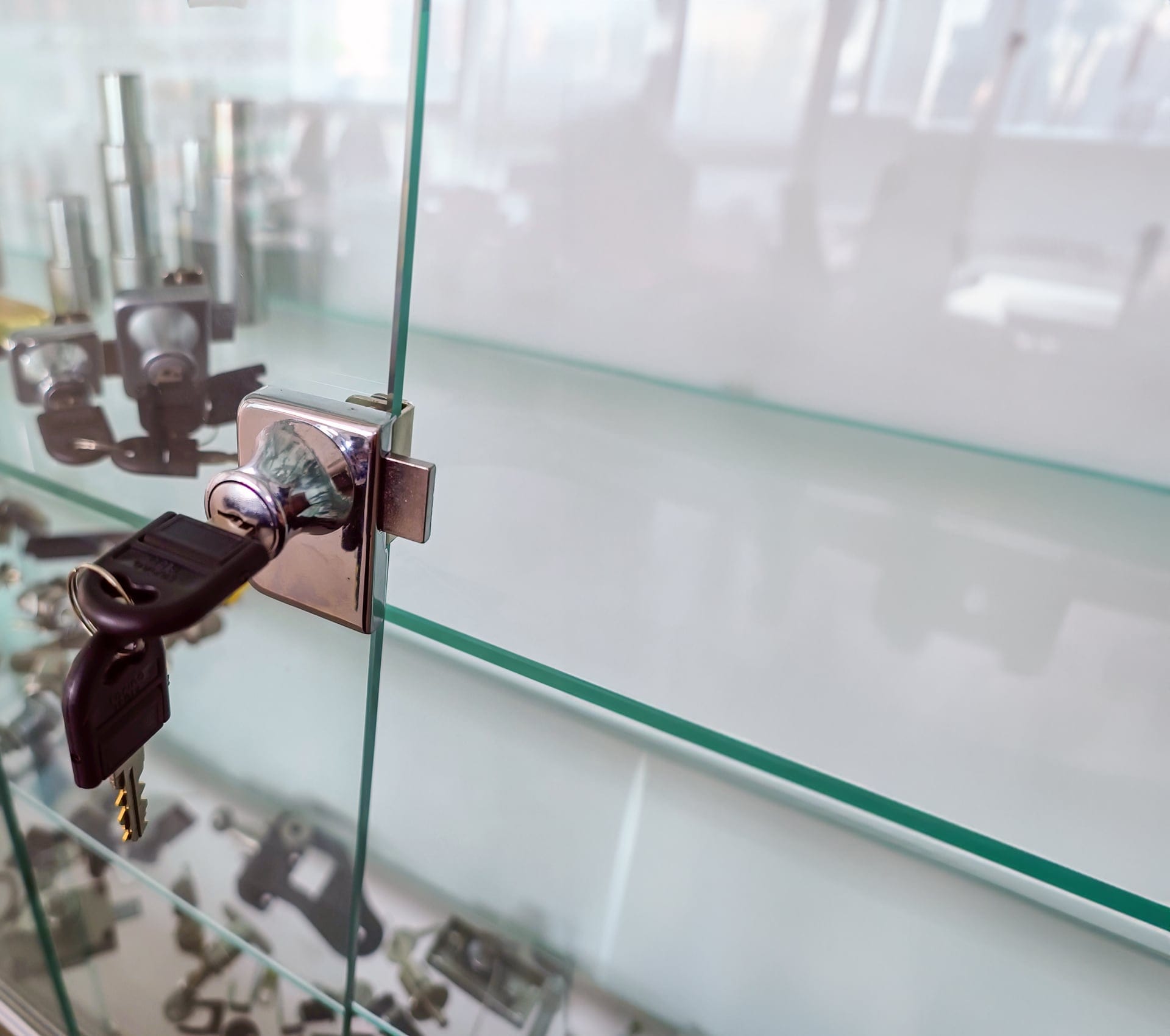 Locks for hinged glass doors without drilling.